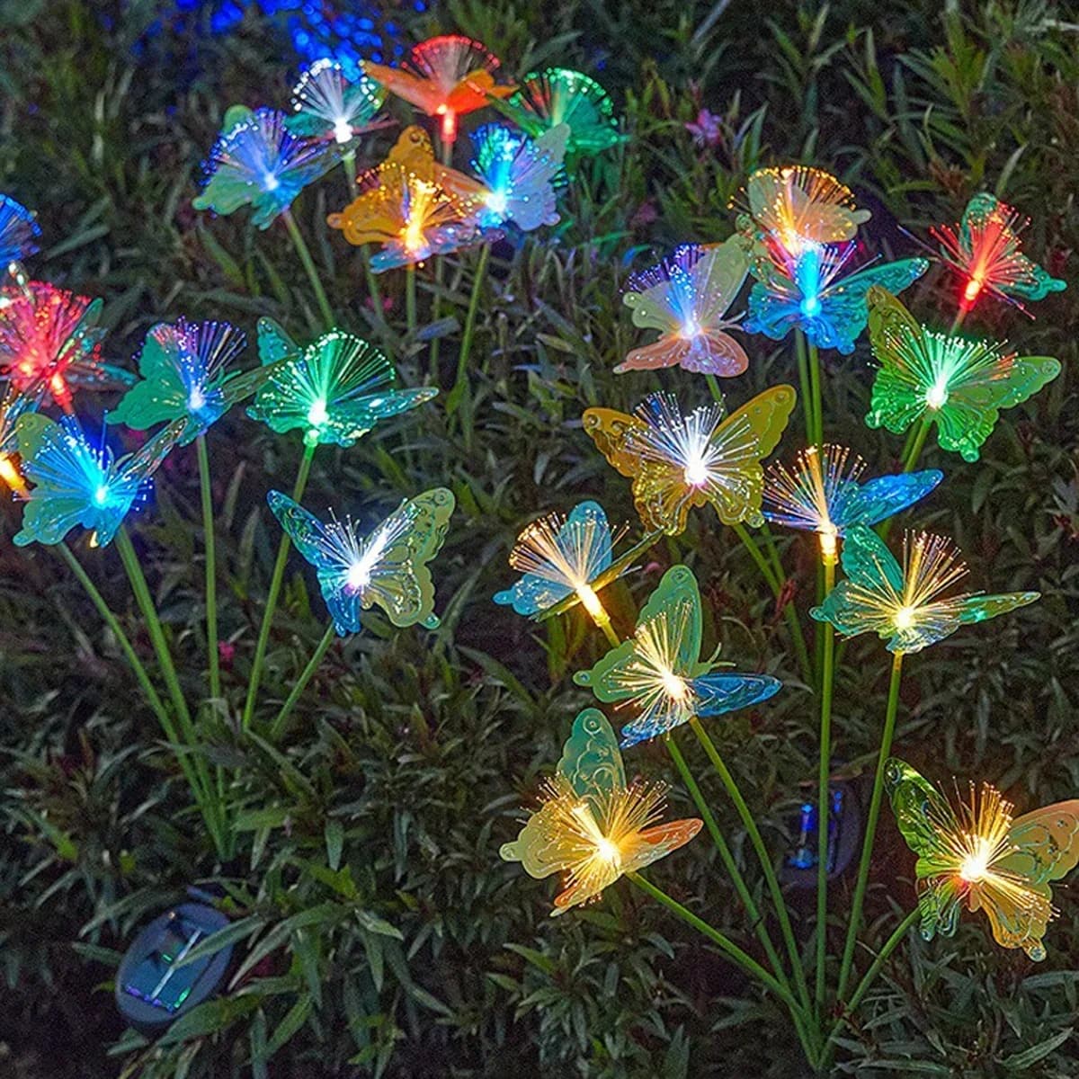 Vandtæt solcellehavebelysning med sommerfugl og fiberoptik